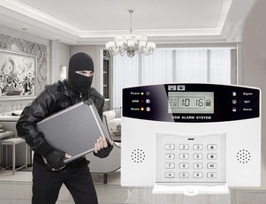 Intruder alarm keypad panel in a home