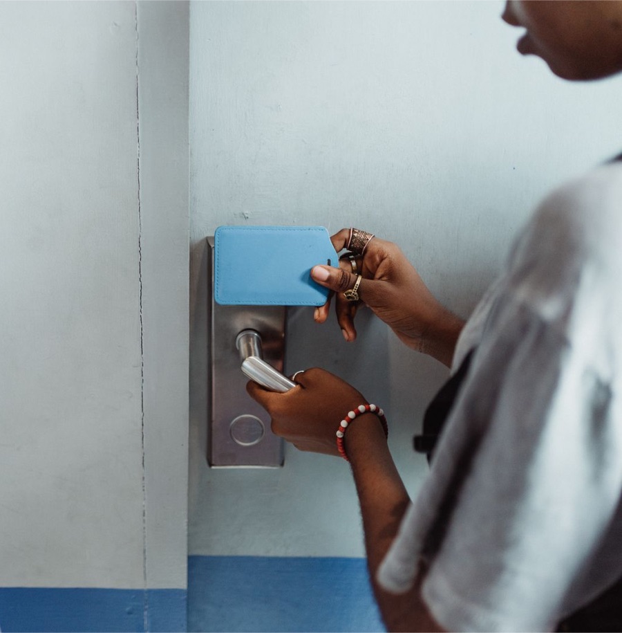 Key card unlocking an electronic door lock